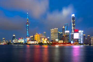 Urban skyscrapers in Shanghai at night