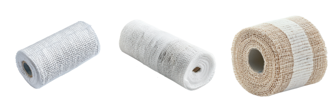 Different types of mesh materials in rolls, perfect for industrial, construction, or crafting uses, laid out on a white background.