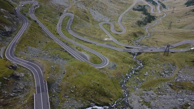 Scenic aerial view over the dramatic switchbacks of the Transfagarasan mountain road in the Carpathians, Romania