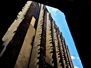 stone blocks emerge from the lime plaster. cathedrals. architraves of the supporting pillars of the...
