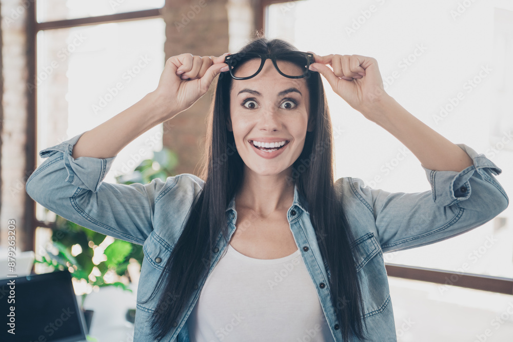 Sticker Photo of impressed good mood lady recruiter dressed denim jacket smiling arms spectacles indoors workplace workstation loft