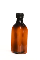 Brown bottle with the liquid isolated on the white background. Front view.