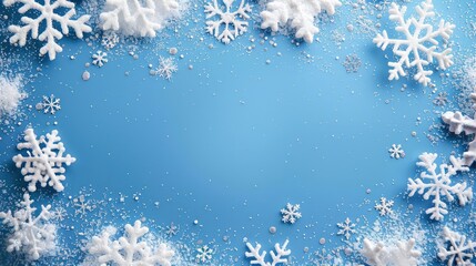 Winter themed blue background with white snowflake border and space for text or images for Christmas season