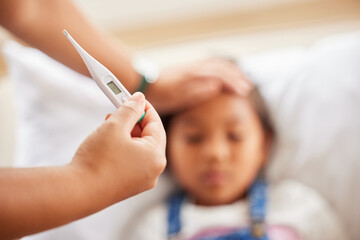 Girl, hand and thermometer for illness in home, sick and tool to monitor temperature in bedroom. Female person, daughter and parent to check for virus on forehead, fatigue and infection or disease