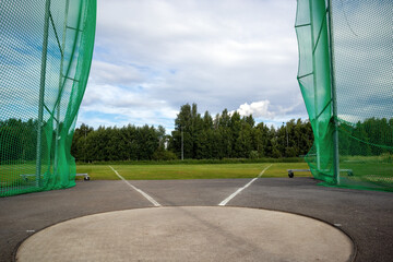 empty discus and hammer throwing ring outdoors