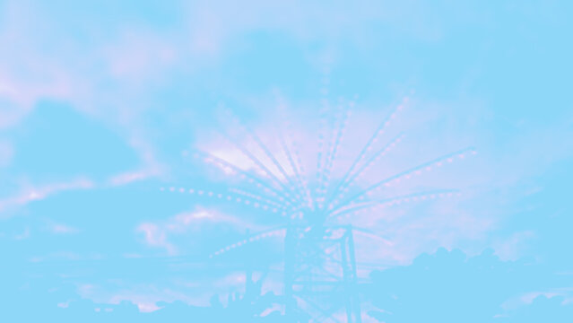 abstract background Flashing lights at the Kaset Fair, Ranong Province, Thailand. Gradient of blue, purple, light white, blur. Light colors, sky, wind, blue, energy, turbine, power, architecture, 