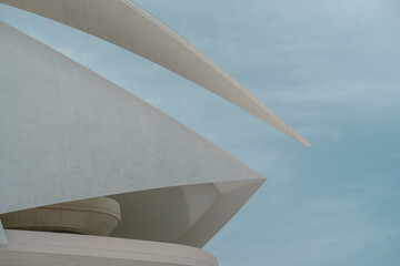 Detailed view of an abstract architectural structure with sharp lines and curves. The modern design emphasizes innovative urban architecture.
