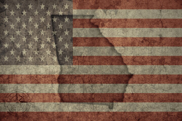 map of georgia state and flag of united states of america on a old vintage crack paper background .