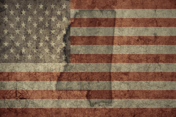 map of mississippi state and flag of united states of america on a old vintage crack paper background .