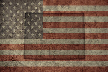 map of wyoming state and flag of united states of america on a old vintage crack paper background .