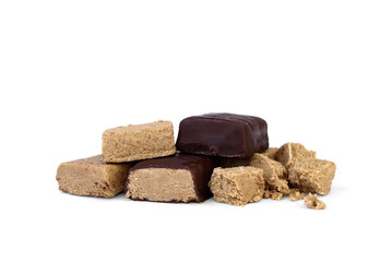 Halva sweets in chocolate isolated on white background.