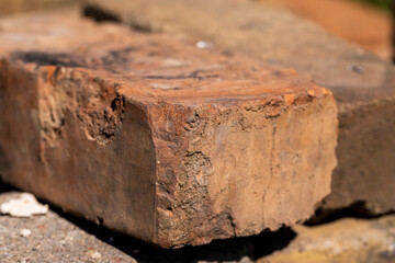old used bricks made of red clay and other materials
