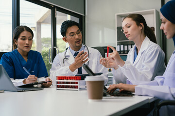 Doctor team, analysis the blood test examination results and medication usage of the patient on the chart, medical check-up concept.