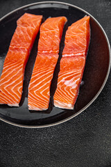 salmon fillet raw red fish seafood appetizer meal food snack on the table copy space food background rustic top view vegetarian food no met Pescetarian