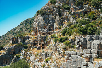 Naklejka premium Myra Ancient City. Ancient Lycian rock tombs are stone tombs in Turkey. Historical ancient place in Demre. Antalya, Turkey.