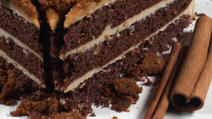 Delicious chocolate cake with cinnamon sticks.
