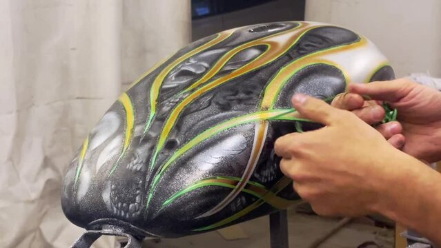Custom painting and airbrush of classic motorcycle
