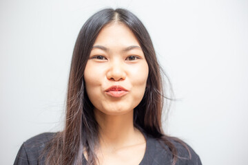 Fototapeta premium Beautiful happy asian women portrait smiling wearing black shirt