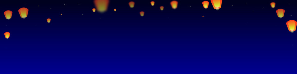 Naklejka premium Sky lanterns floating in the night sky.