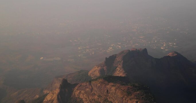 Mumbai, India. Badlapur, Savaroli, Maharashtra. Aerial View From plane Window On View of the Mumbai suburb district. Evening morning sunset sunrise light. residential district skyline cityscape
