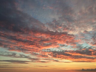 Beautiful sunset with light boncing of the clouds