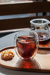 cup of tea and cookies on the table