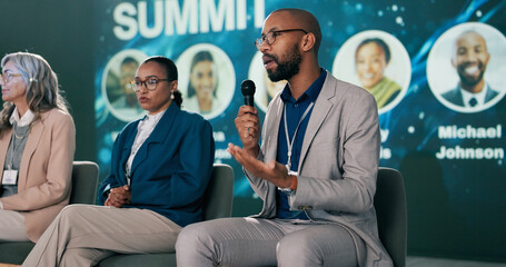 Stage, man and presenter at conference as event host, panel discussion and guest with microphone....