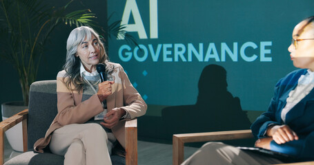 Conference, presentation and woman with mic at stage for innovation speech, event and development....