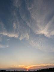 Sun moon together in Bangkok cloudy evening 