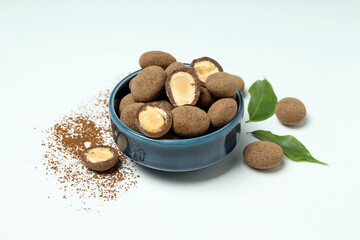 Almonds in chocolate, concept of tasty sweet food