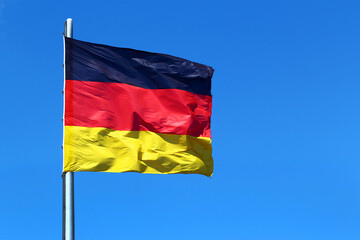 Flag of Germany on Bundestag building in Berlin