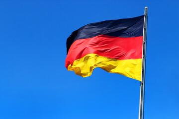 Flag of Germany on Bundestag building in Berlin