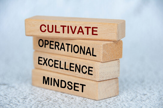 Cultivate operational excellence mindset text on wooden blocks. Operational excellence concept