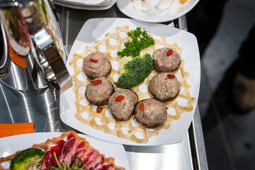 Steamed food in water bath, a new form of cooking in Vietnam. Brings little health benefits and is delicious