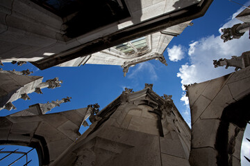 Decorative details in neo-Gothic style against the sky on the roof of the New Town Hall, Munich