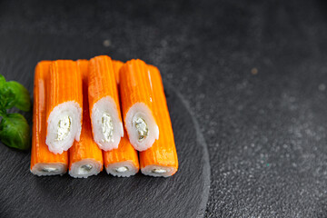 crab stick stuffing cream cheese and herbs natural fresh appetizer meal food snack on the table copy space food background rustic top view