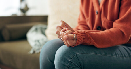 Closeup hands, anxiety and woman on sofa for mental health, depression or counselling session in...