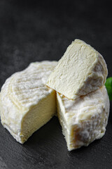 soft cheese cow milk, goat or sheep cheese natural fresh appetizer meal food snack on the table copy space food background rustic top view