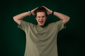 Stressed Man Holding Head in Frustration