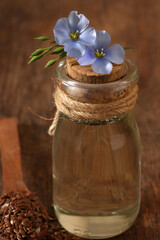organic flaxseed oil on wooden table