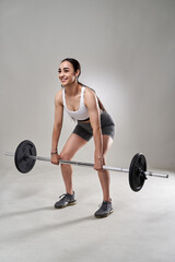 Fitness girl doing deadlifts