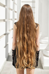 Blonde female hair back, summer outdoors