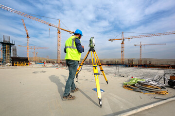Construction process with workers and crane
