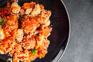 couscous food meat balls vegetable sauce tasty fresh meal snack on the table copy space food background rustic top view