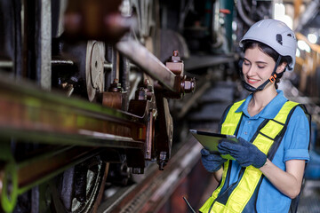 Engineer checking construction process railway and checking work on railroad station . Railway...