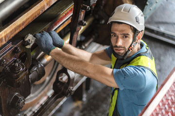 Engineer checking construction process railway and checking work on railroad station . Railway...