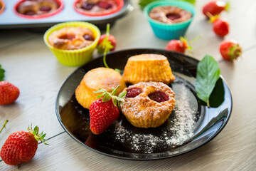 Sweet curd muffins with strawberry filling