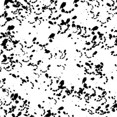 Abstract texture of black mascara splatters on a white background