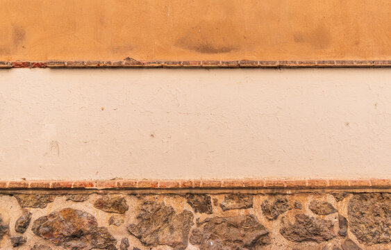 Enduit sur un mur de pierre ancien, Madrid, Espagne