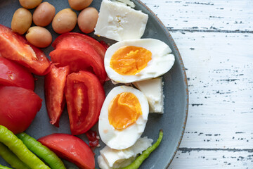 healthy breakfast with boiled eggs and salad